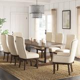 Laurel Foundry Modern Farmhouse® Heinz Extendable Dining Set Wood/Upholstered Chairs in Brown | Wayfair F24765F102D64FEE9E069171BFEB4A3F