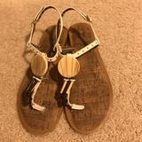 Jessica Simpson Shoes | Jessica Simpson Flat Sandals | Color: Tan/White | Size: 7