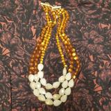 Anthropologie Jewelry | Anthropologie Triple Strand Beaded Necklace | Color: Brown/White | Size: Os