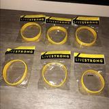 Nike Accessories | 6 Lance Armstrong Bracelets 5 Adult And 1 Youth | Color: Black/Yellow | Size: 5 Adult Sized And 1 Youth Sized
