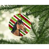 The Holiday Aisle® Horse Holiday Christmas Hanging Figurine Ornament Ceramic/Porcelain in Brown/Green/Red, Size 3.0 H x 3.0 W x 0.25 D in Wayfair