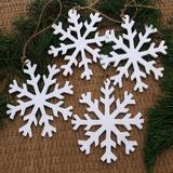 The Holiday Aisle® Set of 4 Snowflake Holiday Shaped Ornament Wood in Brown/White, Size 4.9 H x 4.5 W x 0.2 D in | Wayfair