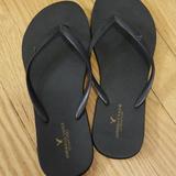 American Eagle Outfitters Shoes | Flip Flops | Color: Black | Size: 56