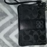 Coach Bags | Black Coach Animal Print Leather Mini Clutch | Color: Black | Size: Os