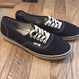 Vans Shoes | Black Lace Up Tie Flat Vans Sneakers | Color: Black/White | Size: 7.5