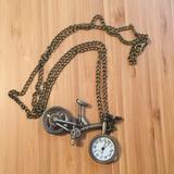 Anthropologie Jewelry | Anthropologie Bicycle Clock Necklace | Color: Gold/Silver | Size: Os