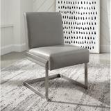 Orren Ellis Tofino Dining Chair Faux Leather/Upholstered in Gray, Size 35.0 H x 21.0 W x 23.0 D in | Wayfair 3EE9EDCCFA9D460ABEC8189497200CEB