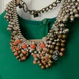 Anthropologie Jewelry | Anthropology Bib Chrome Necklace | Color: Orange/Silver | Size: Os