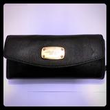 Michael Kors Bags | Gentlyused Micheal Kors Trifold Leather Wallet | Color: Black/Gold | Size: Os