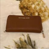 Michael Kors Bags | Michael Kors Brown Leather Slim Zipper Wallet With Coin Pocket And Card Slots | Color: Brown/Tan | Size: Os