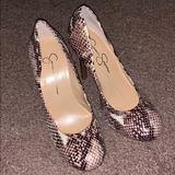 Jessica Simpson Shoes | Jessica Simpson Snakeskin Calie Pump | Color: Black/Cream | Size: 7