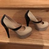 Jessica Simpson Shoes | Jessica Simpson Cheetah Beige Platform Heels 8.5 | Color: Cream/Purple | Size: 8.5