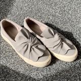 American Eagle Outfitters Shoes | Grey Slip On Shoes With Knot In Front | Color: Gray/White | Size: 7