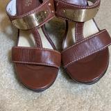 Michael Kors Shoes | Michael Kors Brown Leather Gold Mk Plate Slide Madras Platform Heels | Color: Brown/Gold | Size: 6