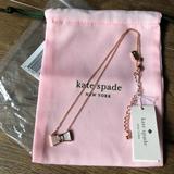 Kate Spade Jewelry | Kate Spade-Nwt Rg Plated Bow Necklace | Color: Gold/Pink | Size: Os