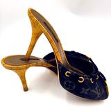 Louis Vuitton Shoes | Louis Vuitton Blue Monogram Denim Bow Cork Heel 36 | Color: Black/Tan | Size: 6