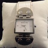 Michael Kors Accessories | Michael Kors Logo White Strap Silver Dial Watch | Color: Silver/White | Size: Fit Size 6 14 Wrist.