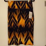 Lularoe Skirts | Lularoe Cassie Nwt | Color: Black/Gold | Size: S