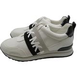 Michael Kors Shoes | Michael Kors Teddi Lasered Slip-On Trainer Sneaker | Color: Black/White | Size: 7.5