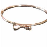 Kate Spade Jewelry | Kate Spade Thin Bow Tie Bracelet | Color: Gold | Size: Various