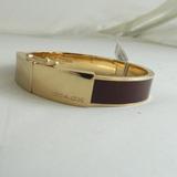 Coach Jewelry | Coach Half Inch Lozenge Hinged Bangle Brown | Color: Brown/Gold | Size: Os