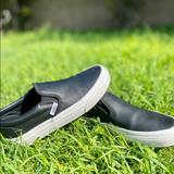 Vans Shoes | Black Leather Slip-On Vans | Color: Black/White | Size: 5