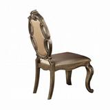 Rosdorf Park Merlino Tufted King Louis Back Side Chair in Dark Gold Faux Leather/Wood/Upholstered in Brown/Yellow, Size 43.0 H x 22.0 W x 26.0 D in