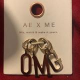 American Eagle Outfitters Jewelry | Ae X Me Gold Letter Charms | Color: Gold | Size: Os
