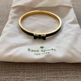 Kate Spade Jewelry | Kate Spade Black And Gold Bow Bangle Bracelet | Color: Black/Gold | Size: Os