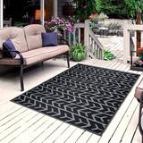 Black Area Rug - Wade Logan® Aveza Reversible Outdoor 100% Recycled Plastic Floor Mat/Rug - Weather, Water, Stain in Black | Wayfair