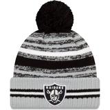 Men's New Era Black/Silver Las Vegas Raiders 2021 NFL Sideline Sport Official Pom Cuffed Knit Hat