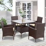 Red Barrel Studio® Esma Square 4 - Person 35" Long Dining Set w/ Cushions Glass/Wicker/Rattan in Brown, Size 29.0 H x 35.0 W x 35.0 D in | Wayfair