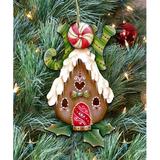 The Holiday Aisle® Joy Gingerbread House Wood Hanging Figurine Ornament Wood in Brown/Red, Size 5.0 H x 4.0 W x 0.25 D in | Wayfair