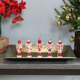 The Holiday Aisle® 5 Piece Nutcracker Christmas Hanging Figurine Ornament Set Wood in Red/White, Size 5.25 H x 1.25 W x 1.25 D in | Wayfair