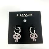 Coach Jewelry | Coach Pave Bow Huggie Earrings | Color: Pink/Silver | Size: Os