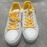 Michael Kors Shoes | *Excellent Condition* Michael Kors Designer Shoes | Color: White/Yellow | Size: 7