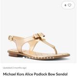 Michael Kors Shoes | Michael Kors Alice Padlock Bow Thong Sandal | Color: Gold | Size: 9.5