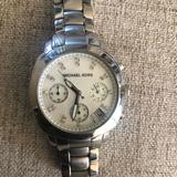 Michael Kors Accessories | Silver Stainless Steel Michael Kors Watch, Mother Of Pearl Face, Crystal Accents | Color: Silver | Size: Os