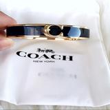 Coach Jewelry | Coach Signature Push Hinged Black Bangle | Color: Black/Gold | Size: Os