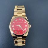 Michael Kors Accessories | Michael Kors Gold Watch With Coral Red Face | Color: Gold | Size: Os