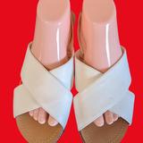 Jessica Simpson Shoes | Jessica Simpson White Leather Criss Cross Flat Sandals 8 | Color: White | Size: 8