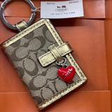 Coach Accessories | *Nwt*Coach Large Signature C Picture Frame Keychaincharm | Color: Gold/Tan | Size: 4 14 Length From Ring Top X 2 14 Closed