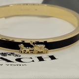 Coach Jewelry | Coach Nwtstunning Black & Gold Bangle Wclassic Horse & Carriage Design! | Color: Black/Gold | Size: Os
