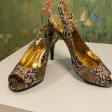 Jessica Simpson Shoes | Jessica Simpson Animal Print Leather Sling Back Heels | Color: Black/Tan | Size: 7