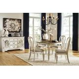 Realyn White Oval Extendable Dining Table