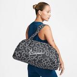 Nike Women's Gym Club Swoosh Print Bag in Black/Black 100% Polyester
