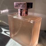 Ralph Lauren Accessories | 3.4oz Beyond Romance By Ralph Lauren Eau De Parfum | Color: Orange/White | Size: 3.4oz