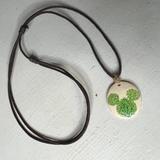 Disney Jewelry | Disney Mickey Mouse Green Leaf Nature Pendant Cord Necklace Adjustable Choker | Color: Cream/Green | Size: Os