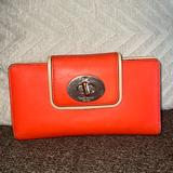 Kate Spade Bags | Kate Spade Stacy Hampton Burn Orange Leather Turn Lock Wallet Clutch | Color: Orange | Size: Os