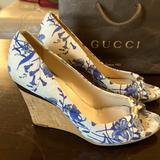 Gucci Shoes | Gucci Blue And White Floral Print Canvas Peep Toe Wedge Sandal Heels | Color: Blue/Silver/White | Size: 7.5